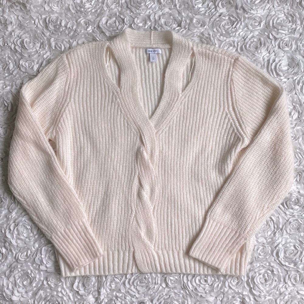 New women’s v neck cutout sweater with front twist size medium